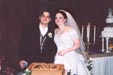 Couple by groom cake.